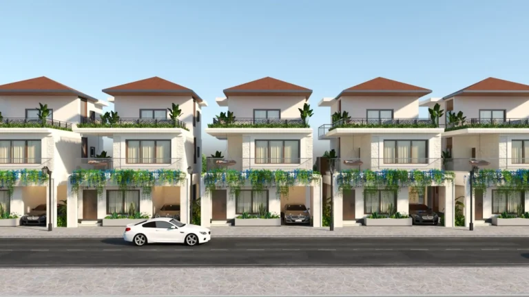 Triton Humming Valley villa row seen from the street, showing balconies, cascading planting and covered parking, 3D render by SH Visual